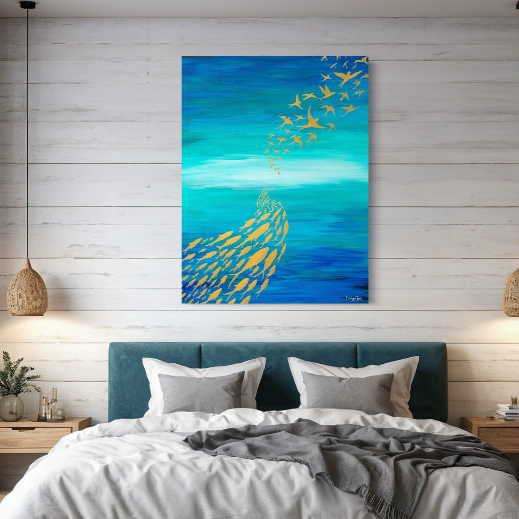 An artwork highlighting the importance of adaptability. “Be a fish in the sea and a bird in the sky”. The contrast of blue and gold will add a touch of sophistication to any space (home or office). Choose from framed or non-framed options for a touch of elegance. Displayed on a light wooden planked wall in the bedroom..