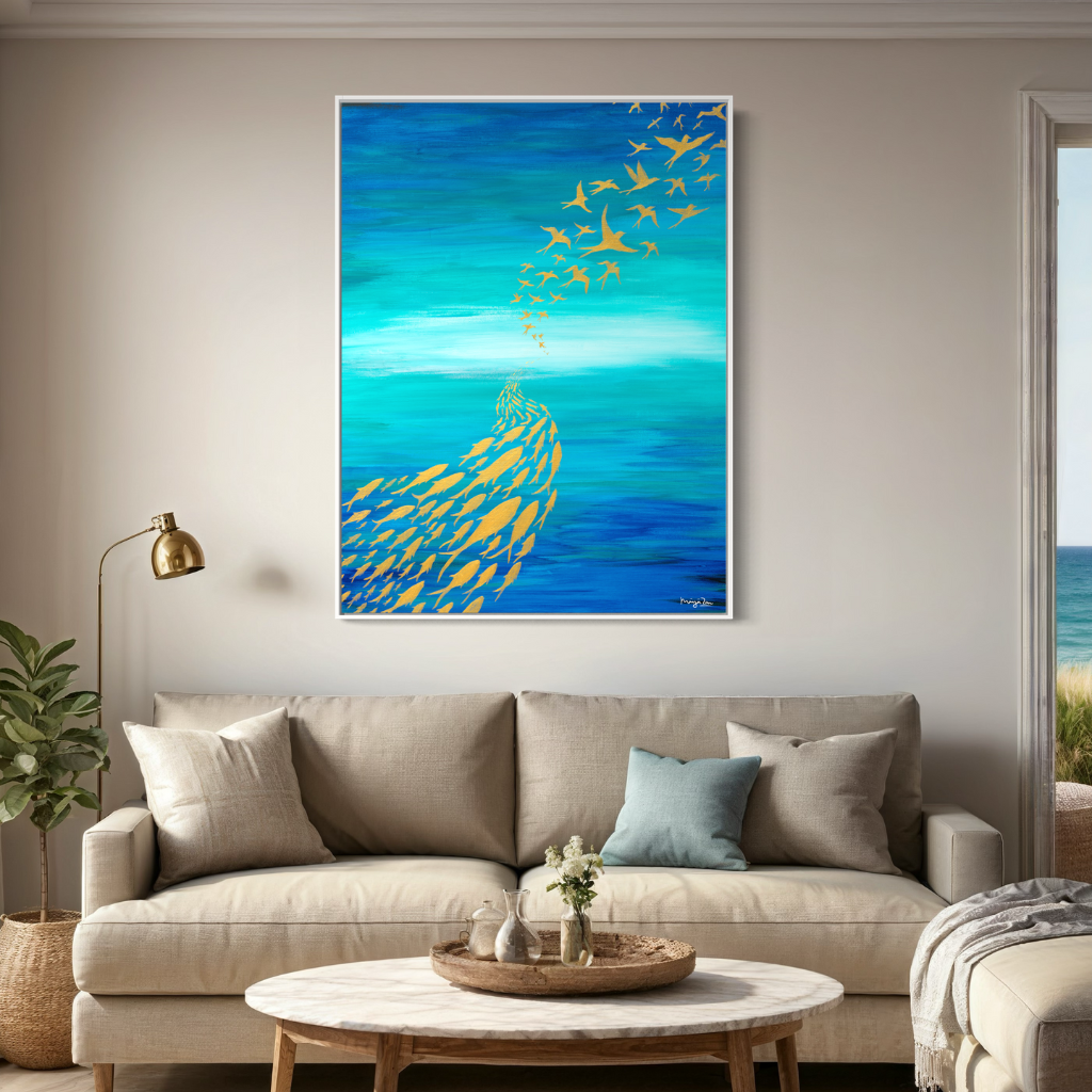 An artwork highlighting the importance of adaptability. “Be a fish in the sea and a bird in the sky”. The contrast of blue and gold will add a touch of sophistication to any space (home or office). Choose from framed or non-framed options for a touch of elegance. Displayed on a light coloured wall with linen couch