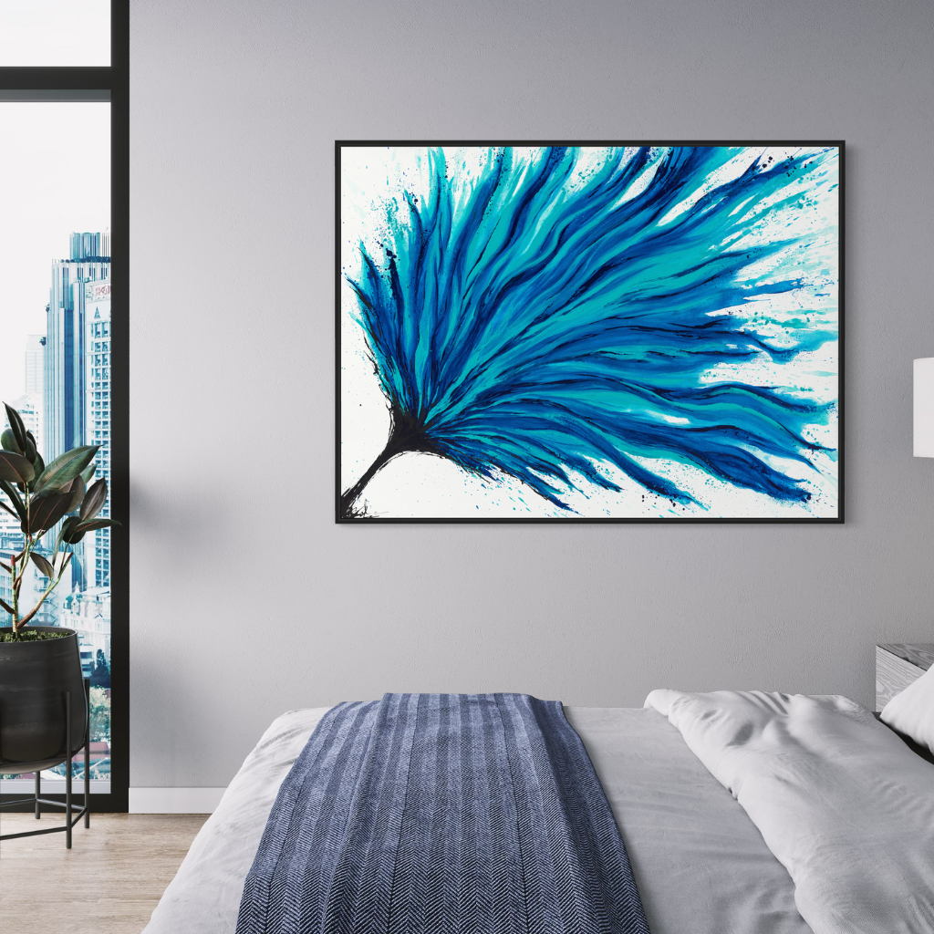 Add a splash of blue to your space with this modern abstract framed canvas print. A perfect addition of colour to any space. Choose from framed or non-framed options for a touch of elegance. Displayed on a light grey bedroom wall.