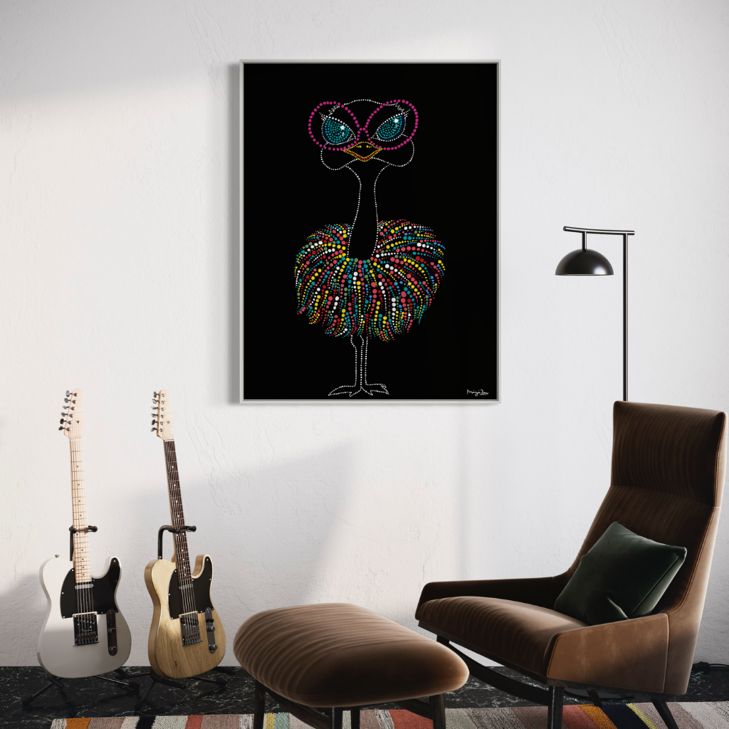 Add a splash of style and flamboyance to your home with this modern abstract ostrich framed canvas print. A colourful and vibrant ostrich painted with dotting technique. Displayed on a white wall netct to brown leather chair with guitars on the side.