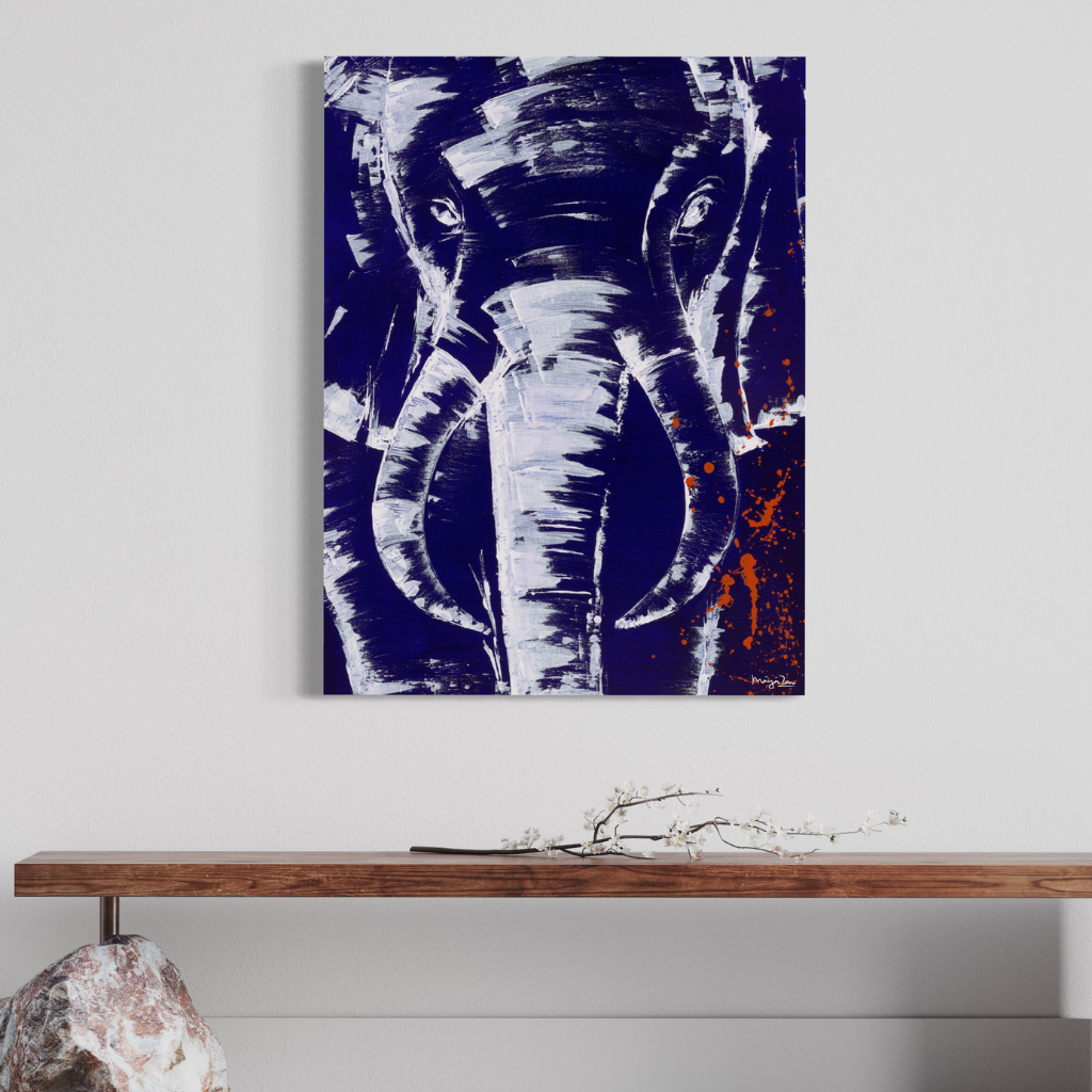 A stunning artwork that commands attention with its mighty presence against a serene blue background accented with intricate white knife work. The mighty elephant depicted in this piece exudes strength and grace, making it a striking focal point in any room. Available in framed or non-framed options.