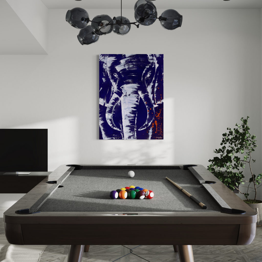 A stunning artwork that commands attention with its mighty presence against a serene blue background accented with intricate white knife work. The mighty elephant depicted in this piece exudes strength and grace, making it a striking focal point in any room. Available in framed or non-framed options.