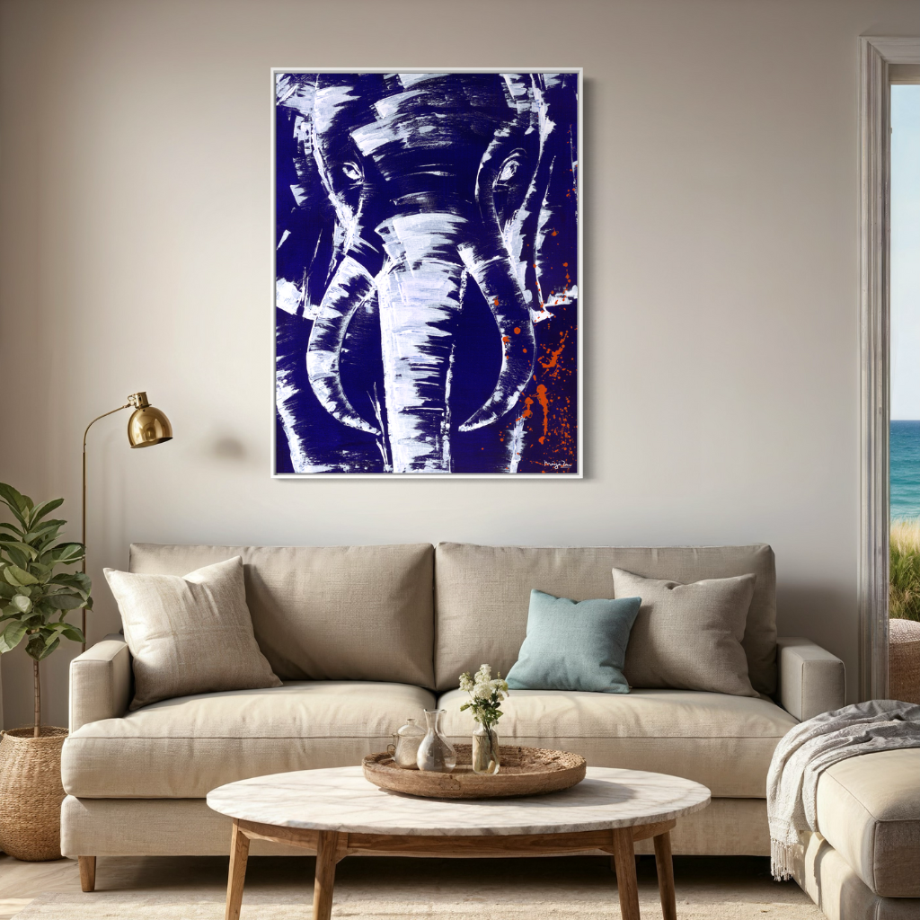 A stunning artwork that commands attention with its mighty presence against a serene blue background accented with intricate white knife work. The mighty elephant depicted in this piece exudes strength and grace, making it a striking focal point in any room. Available in framed or non-framed options.