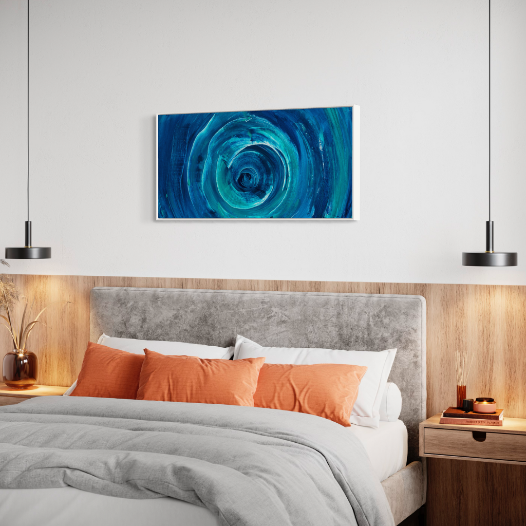 Add a splash of blue to your space with this modern abstract framed canvas print. A perfect addition of colour to any space. Choose from framed or non-framed options for a touch of elegance. Displayed on a white wall in the bedroom
